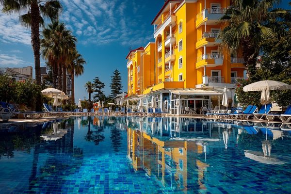 hotel in Durres, bright vivid colors --chaos 15 --ar 4:3 --oref https://s.mj.run/4NoHL20TWkQ --ow 150 --v 7 Job ID: 100259e4-239a-4ba2-8012-7bc50ee955d4
